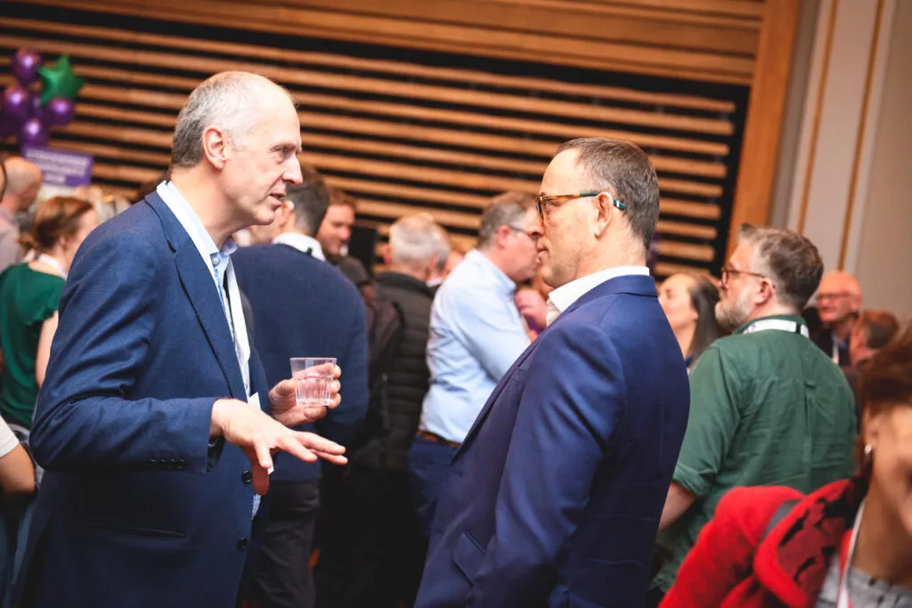 delegates chatting